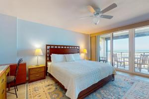 Oceanfront condo with pool, ocean views, and washerdryer