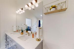 The Barefoot Bungalow | House in Palm Coast with an enclosed pool & grill