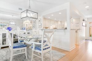 Dog-friendly oceanfront townhouse with covered balcony, views, pool & AC