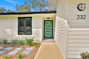 Renovated home with private pool, patio, outdoor fireplace, & grill