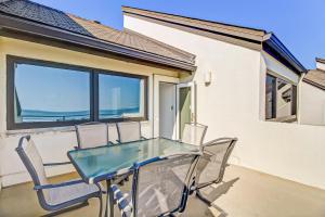 2nd-floor, oceanfront condo with balcony, sunrise views & pool - near the beach