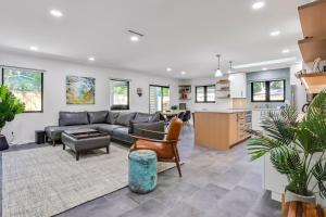 Renovated home with private pool, patio, outdoor fireplace, & grill