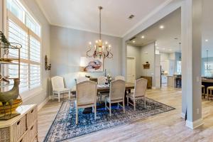 Golf course-view home near beaches with deck, porch, grill, streaming, WD, & AC