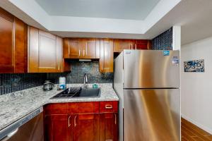 Condo across the street from the beach with pool, tennis, & washerdryer