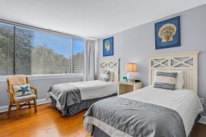 Elegant ocean-view townhome with beach access & pool - perfect location