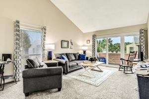 Oceanfront condo with pool, grill, central AC, washerdryer, & snowbird friendly