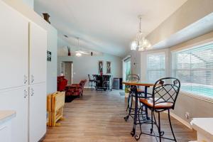 Spacious home with enclosed pool, open layout, washerdryer, internet, & AC