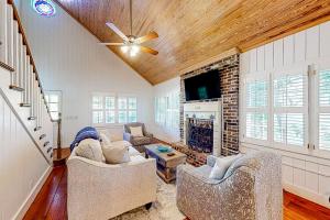 Classic coastal home with game room & private hot tub - walk to beaches