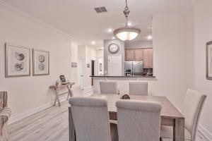 Elegant waterfront condo with central AC, balcony, and shared pools & hot tubs