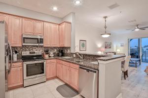 Elegant waterfront condo with central AC, balcony, and shared pools & hot tubs