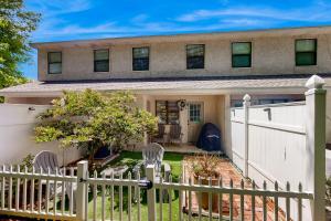 Inviting condo with an outdoor pool, washerdryer, & AC - near the beach