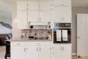 Beach house & backyard oasis with private pool - short walk to beach