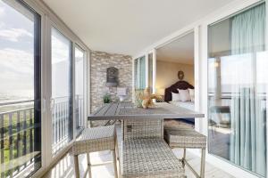 Seventh Floor Oceanfront Condo with Shared Pool, Ocean View, & High-Speed WiFi