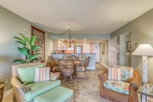 Island-themed living with furnished patio, shared pool & beach access