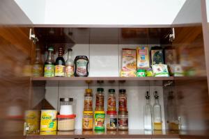 The Modern Nest Stylish 1BR MbeziBeach with Fast WiFi, Work Desk & Smart Home