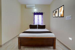 Hotel O Kalpatharu Boarding and Lodging