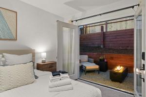 The Palm House by Coastline Vacation Rentals