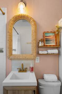 The Palm House by Coastline Vacation Rentals