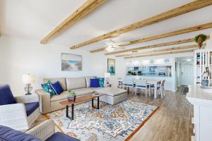 Oceanfront condo with private balcony, shared pool and beach access