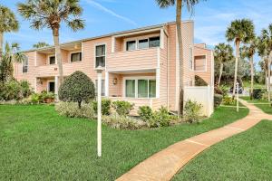 Oceanfront condo with pool, grill, central AC, washerdryer, & snowbird friendly
