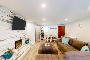 Beach house & backyard oasis with private pool - short walk to beach