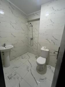 2 Bedrooms 3 beds and a living room in Dar Bouazza