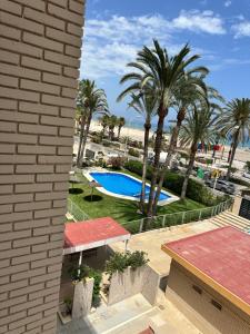 Apartamento con vistas al mar con piscina y parking en primera línea en Playa de San Juan, Alicante