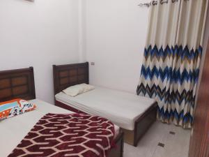 عمارة 26 شارع عبدالحميد سليمان الدور الارضي المرتفع