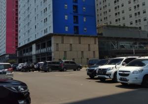 Green Pramuka City apartment by SM ROOM