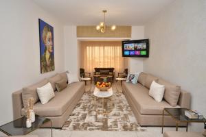 Abdelmoumen Central Spacious Haven