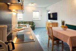 Three-Bedroom Apartment with Balcony room in Adlerhorst Apart