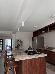 Casa vista mar em ponta negra, O Burguês da Praia PN