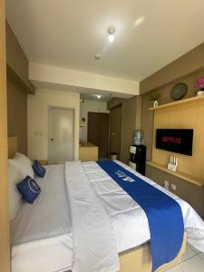 Apartement Podomoro Golf View By Ensroom