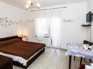 Family Apartmani Sara Malinska