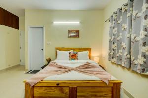 Saffron Breeze Spacious 4-BHK Apartment with Living & Balcony