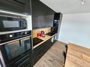Funky 2 chambres 4 pers WIFI TV