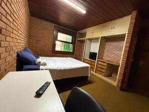 Quarto confortável no Centro