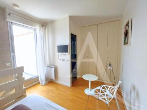 T2 avec espace nuit en mezzanine et 2 terrasses