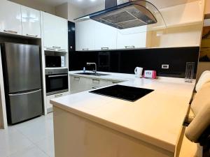 Spacious 1-Bedroom Condo with Large Balcony at Baan Suan Lalana