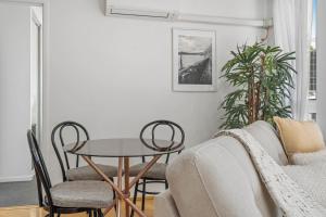 Stylish 2BR Retreat with Pool, Gym and Balcony