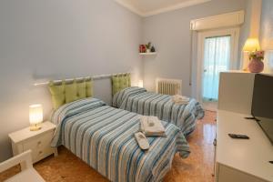Camera Azzurra con veranda privata - Madame Fannj