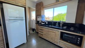 Residencial Paegle - Bloco A - Familia e Praia