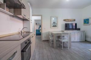 GuestHost - Gabbiano Lovely Flat with Veranda