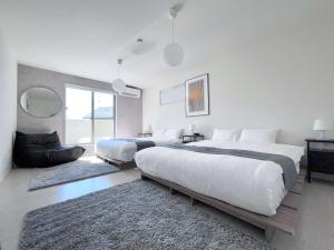 Convenient Ozu Location Bright 4BR Stay by Restavio