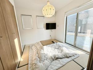 Convenient Ozu Location Bright 4BR Stay by Restavio