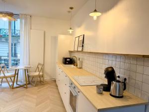 L Escapade du 9ᵉ Appartement élégant et confortable au cœur de Paris