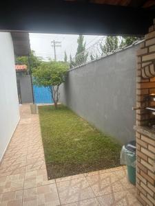 Casa aconchegante e cheia de espaço, para variar memórias e fazer churrascos incríveis