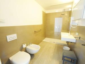 Apartment Dreizimmerwohnung mit direktem Zugang zum Garten by Interhome