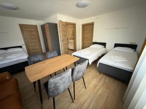 SALGIRDO svečių namai