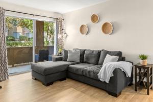 The Charming Condo First floor, patio, and pool